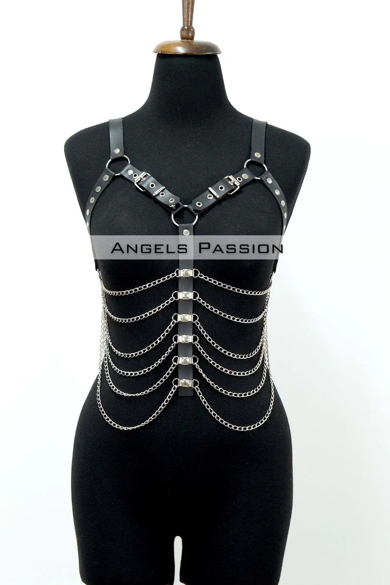 Black faux leather chest harness with silver chain detail cascading down