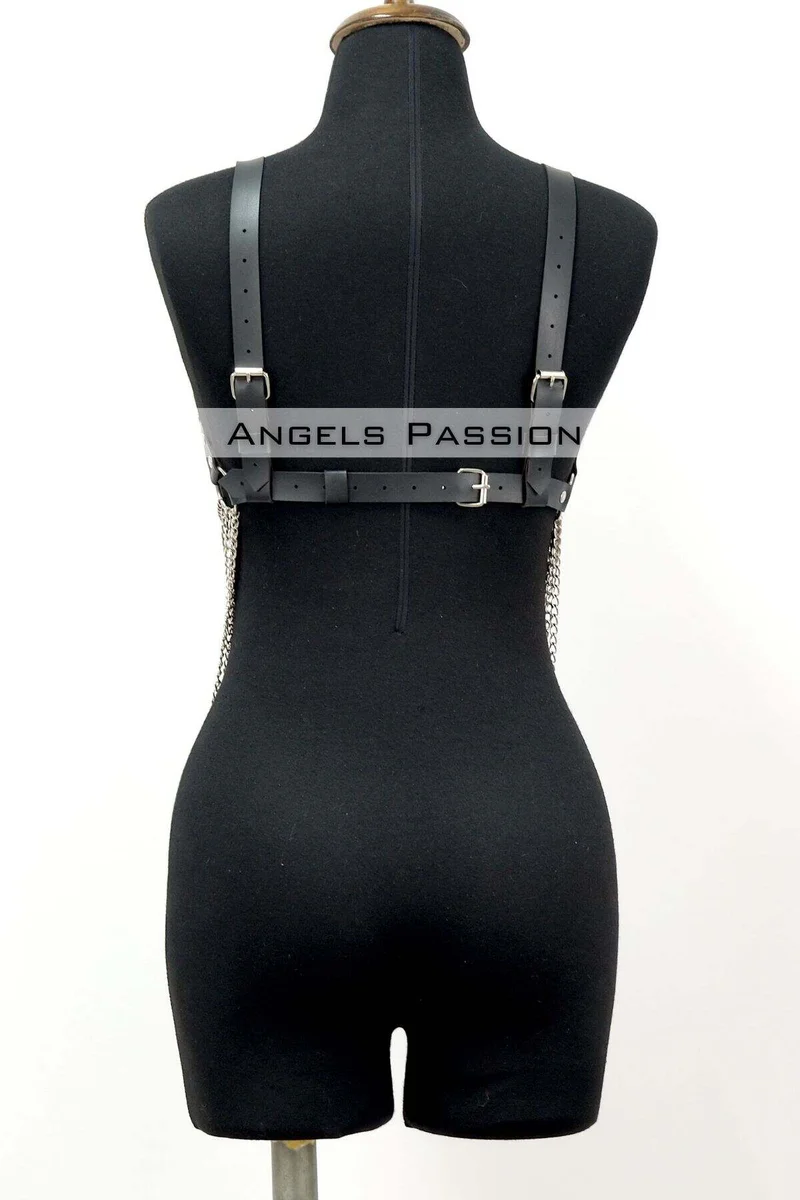 Black leather chest harness with silver chain detail and buckles on back