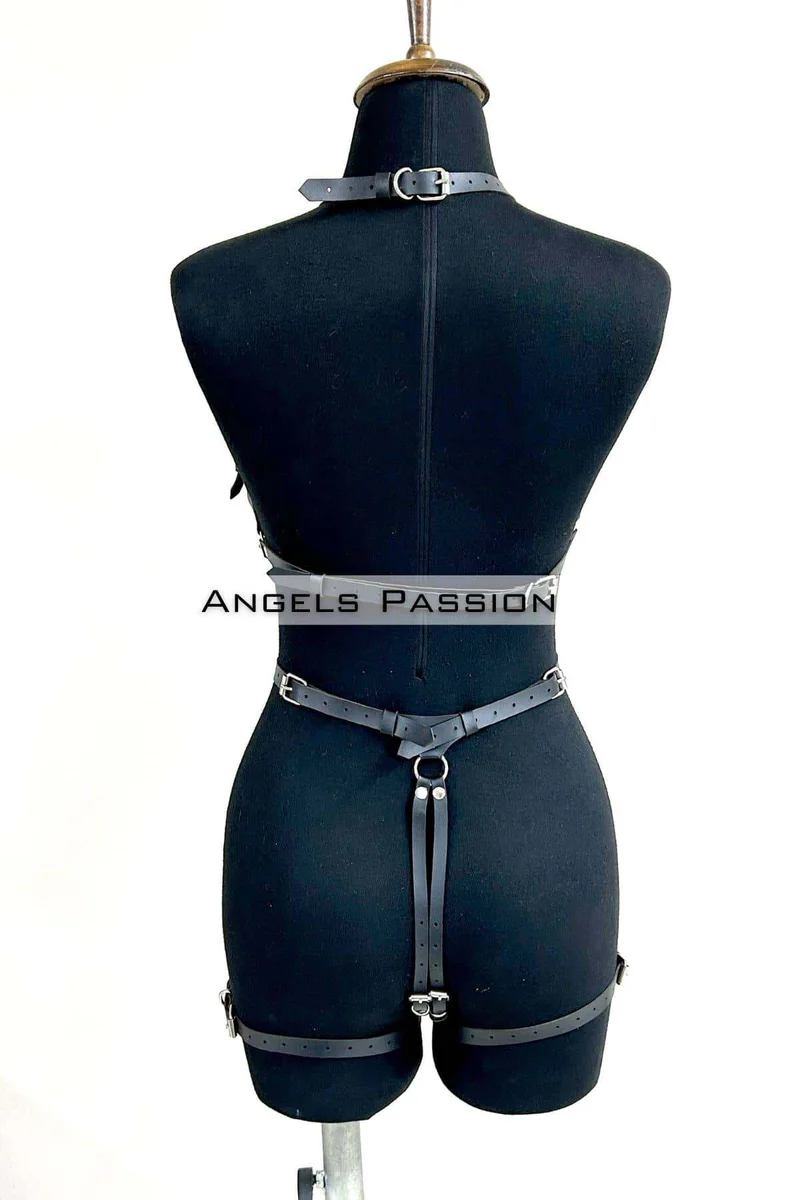 Side profile of black faux leather body harness showing strap configuration