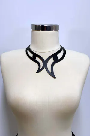 Black sculpted faux leather choker necklace on a model