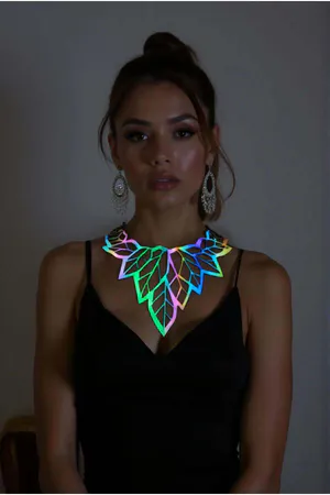 Rainbow iridescent leaf choker necklace on a woman, reflective material