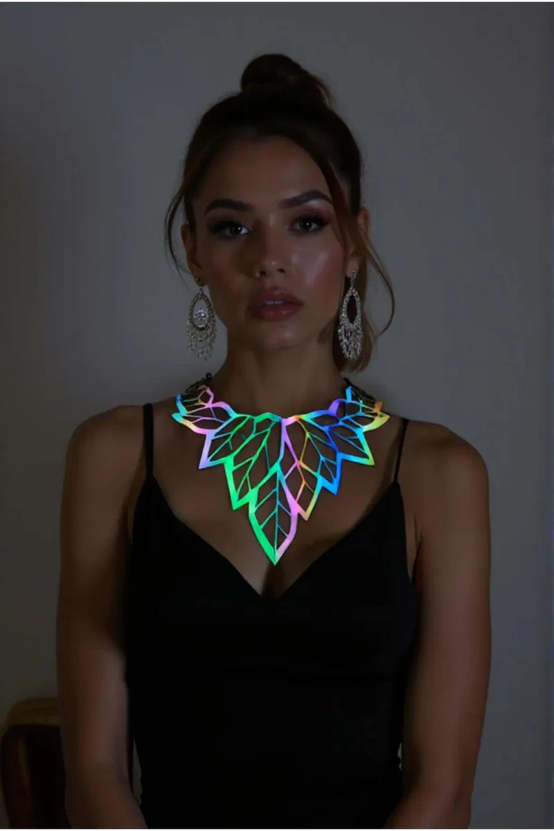 Rainbow iridescent leaf choker necklace on a woman, reflective material