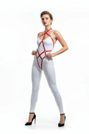 Red strappy vegan leather body harness on model