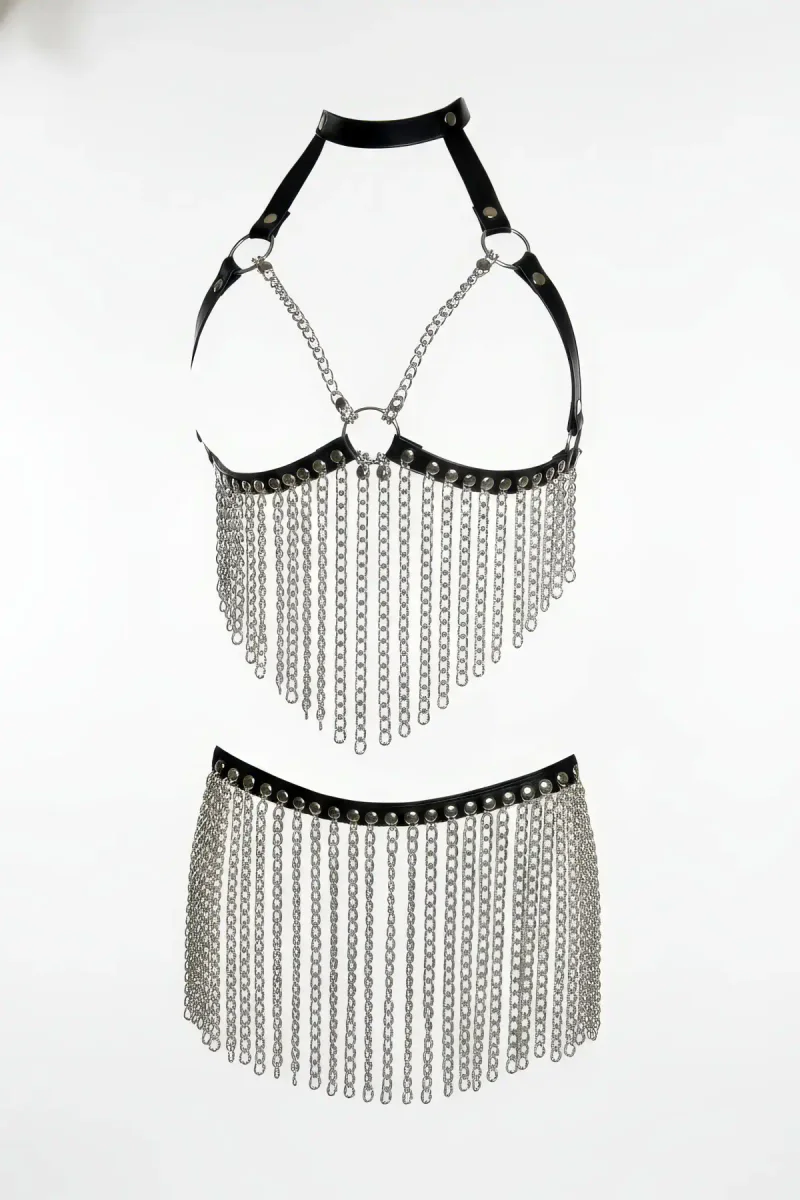 Black faux leather harness bralette with silver chain fringe and matching skirt
