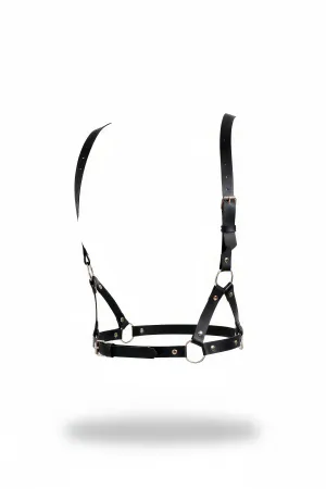Black vegan leather adjustable chest harness with silver O-ring details