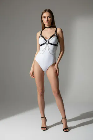 Black Faux Leather Body Harness with Silver Draped Chains over white bodysuit