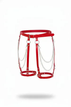 Red faux leather garter harness with multiple silver chain drapes and adjustable straps
