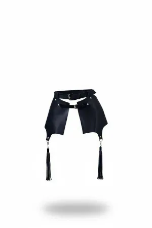 Black faux leather waist harness with asymmetrical skirt panels and dangling black tassels, silver buckle.