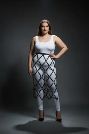 Black diamond lattice skirt harness with O-rings worn by a plus-size model