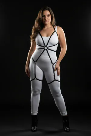 Black adjustable full body harness with O-ring detail worn by a plus size model.