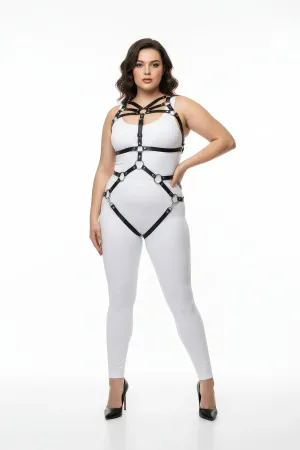 Black faux leather full body harness with O-ring details and adjustable straps on a plus-size model.