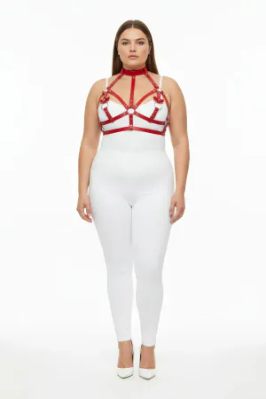Red faux leather strappy body harness with O-ring details and adjustable straps