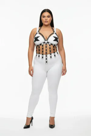 White and black faux leather strappy chest harness with silver O-ring details