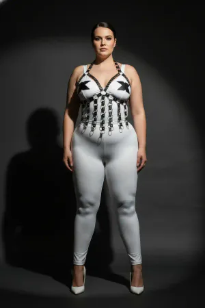 White and black faux leather strappy chest harness with silver O-ring details