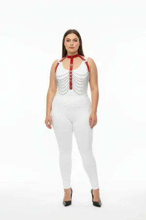Red faux leather body harness with cascading silver chains, worn by a model.