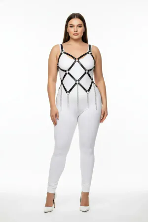 Black faux leather full body harness with diamond lattice and silver chain fringe, worn by a plus-size model