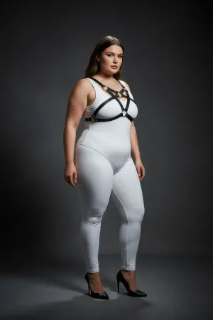 Black vegan leather chest harness with O-ring detail worn by a plus-size model