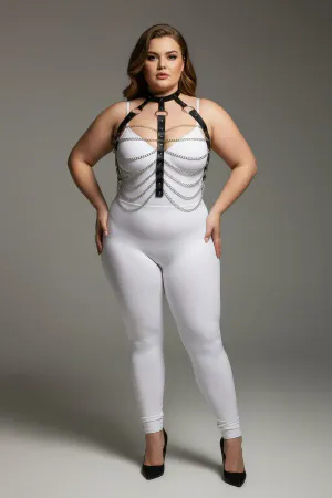 Black faux leather body harness with silver chains, worn by a plus-size model