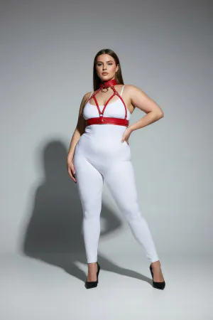Red faux leather strappy body harness with matching choker and O-ring, worn by a plus-size model.