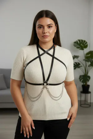 Black Faux Leather Star Chest Harness with Draping Waist Chains worn over a blue dress