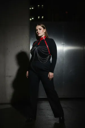Red Faux Leather Chain Body Harness with Choker Detail on a model wearing a black dress