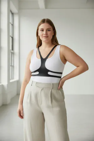 Black Faux Leather Minimalist Chest Harness Overlay for Women over white tank top